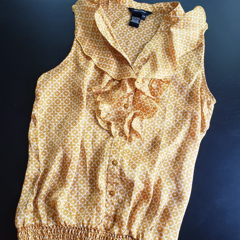Gold sleeveless blouse